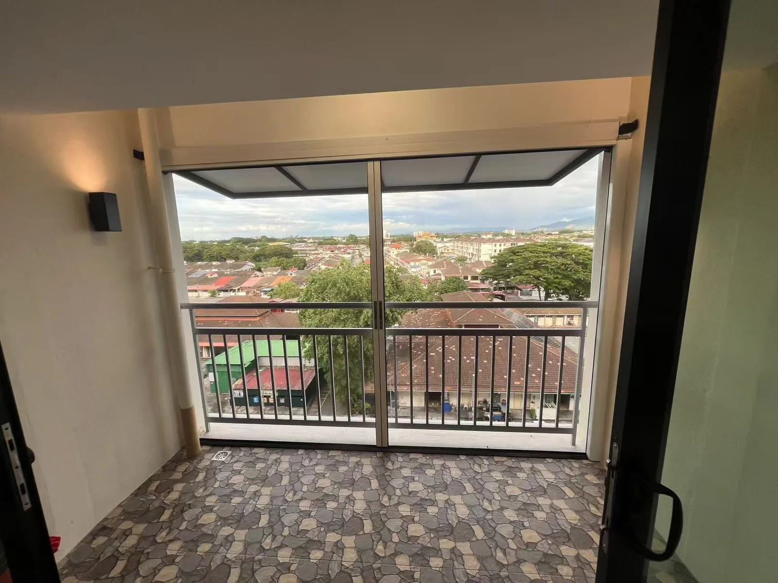 Before roller door balcony opening